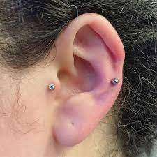 Fresh Helix Piercing And An Upgrade For A Healed Tragus Piercing Not Done By Me Ill Be At Kindredtattoo Tomorrow G Helix Piercing Tragus Piercings Piercing