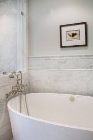 Porcelain tile trim pieces are available in quarter round, chair rail, v cap, and bullnose. Bathroom Tile Chair Rail Border To Chair Rail Tile Powder Room Traditional With Blue Tile Cabinet Cape Traditional Bathroom Tile Bathroom Chair Rail