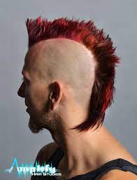A Conventional Mohawk Haircut This Hairstyle Has Length In The Back And Is Accented With A Funky Red Mohawk Hairstyles Men Funky Hairstyles Mohawk Hairstyles