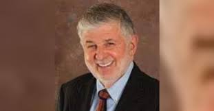 Louis Smith, devoted family man, rabid sports fan, and beloved attorney,  mourned