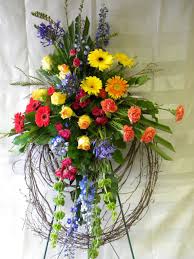 Flowers are a popular gift for all occasions including happy birthday flowers, get well flowers, anniversary flowers, thank you. Eternal Sunshine Grapevine Sympathy Wreath Funeral Flowers Funeral Flower Arrangements Funeral Floral Arrangements