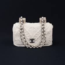 From a thickly knit cardigan worn with a cropped white cotton evening dickey and micro shorts to liquid. Chanel Chanel 2 55 9 Flap White Crochet Knit Shoulder Bag