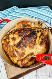 A whole chicken, cut up, seared and roasted in a cast iron skillet with tarragon, thyme and fresh rosemary and lemon slices. Dutch Oven Roast Chicken Walking On Sunshine Recipes