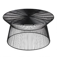 The petra black iron coffee table is a great addition to any outdoor patio set. Round Black Metal Zeke Outdoor Coffee Table World Market