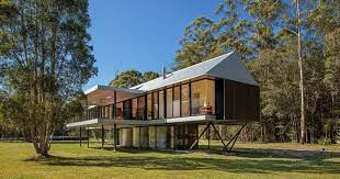 Houses built in flood zones. Platypus Bend House An Elevated House With Rainwater Tanks Underneath Home Design Lover Elevated House House On Stilts Raised House