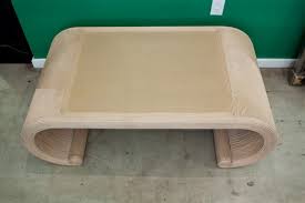 Modern yet casual, our waterfall edge rattan coffee table is artisan woven. Sold Rattan Waterfall Coffee Table Rubbish Interiors Inc