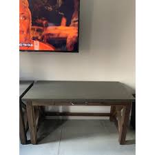 How to build a diy modern farmhouse coffee table | classic square coffee table with painted base and rustic stained table top, complete with bottom shelf for storage. World Market Wood Farmhouse Desk Aptdeco