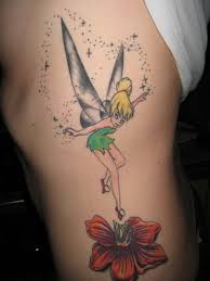 20 Tinkerbell Tattoos And What They Represent Fairy Tattoo Designs Fairy Tattoo Tattoos On Side Ribs