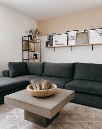 In the living room photo above, the artwork has both beige and gray that allows the different color pillows on the sofa to work well together. 45 Bohemian Living Room Ideas Boho Decor And Style