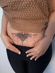 A delicate tattoo can take many forms; 150 Stomach Tattoos That Will Help Make A Bold Style Statement Wild Tattoo Art