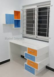 Maybe you would like to learn more about one of these? Kids Furniture Study Table With Zig Zag Drawers Overhead With Open Shelf Orange Blue Decor Washroom Design Study Table Designs Study Table