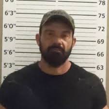 Macon gun suspect found hiding under his staircase