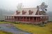 Single Story Log Home With Wrap Around Porch