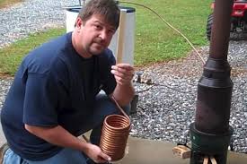 Many people construct a system where they have a smaller storage tank up high on a stand of some type and just pump water up to it from a larger holding tank on the ground when needed using a small electric pump. Diy How To Make Endless Hot Water Without Electricity Tips For Survivalists