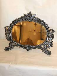This is what happened to me, where the wooden frame was broken in 3 places. Large Oval Victorian Mirror W Black Silver Painted Finish C 1920