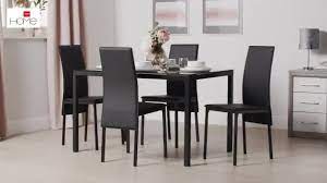Each one is comfortably padded with a unique long backrest and smooth leather effect upholstery. Buy Argos Home Lido Glass Dining Table 4 Black Chairs Dining Table And Chair Sets Argos