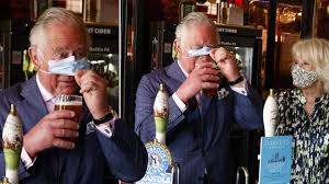 Prince Charles drinks pint and jokes ...