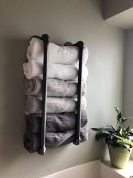 Towel storage in a sauna or bathroom, wine rack in the dining room, a bookcase, a place to keep heirlooms and portraits, and in the kitchen for spices or pots and pans. 20 Bathroom Towel Rack Ideas Magzhouse