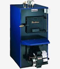 Keep Warm This Winter With An Indoor Wood Furnace From Maine Wood Furnaces Wood Oil Combination Units Wood Add On Indoor Wood Furnace Wood Furnace Wood Oil