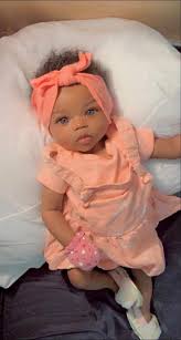 Full soft squashy silicone baby doll with wet and drink system takes a real  pacifier takes a bath drink's from a bottle Length 20 inches long Weight  8lbs Message me now please ❤️🥰