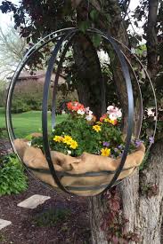 10 Cool Outdoor Planters For People Who Literally Kill Every Plant Outdoor Planters Diy Garden Diy Garden Projects