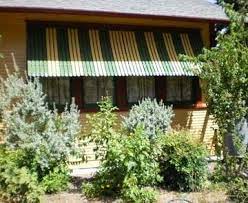 Earthly Gardener A Texas Cottage Garden Blog House Paint Exterior House Exterior Metal Awning
