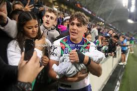 Reece walsh holds his baby after the match between the storm and the warriors, 25 april 2021. 210425stormwarriors 0149 Jpg Photosport New Zealand