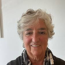 We've loved our Lake Garda holiday and would like a similar experience  somewhere else in the world: lake for swimming, mountain scenery and lively  towns and villages