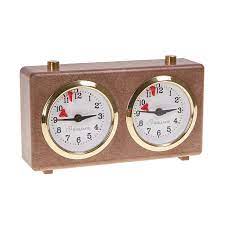 Shop now best chess timers in vast selection, themed analog chess clocks can come in a range of styles, from classic wood to themed styles that are unlike digital timers, analog clocks use a mechanical drop flag to let players know when their time is up. Square Chess Shop Chess Clock Square Classic Brown