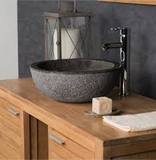 polished grey stone sink with hammered