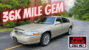 Image result for Light Ice Blue 2007 Town Car