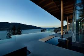 Stunning Lakeside Home Blends Infinity Pool With Lake And Sky Swimming Pool Designs Architecture Pool Designs