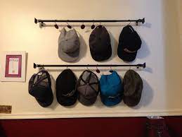 Use Curtain Rods And Shower Curtain Hooks To Organize Hats Shower Curtain Decor Shower Curtain Hooks Hat Organization