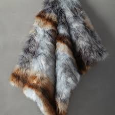 It's the ultimate bachelorette pad decor accent for your bedroom or living room. — mcw. Gray Brown Faux Fur Vertical Stripe Throw