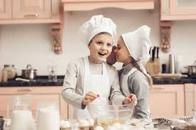 Happy Boy And Girl Cook Together At Home Kitchen Girl Cooking Happy Boy Photo Editing Software