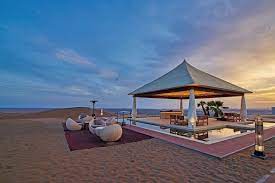 Sitting Amidst A Sea Of Gold Sand Dunes Dunes By Al Nahda Is A Retreat For Sunset Lovers Dunesbyalnahda Luxuryreso Luxury Resort Luxury Tents Desert Resort