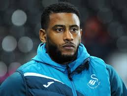 Sam Clucas Swansea City Challenged By Redaktionellt stockfoto