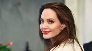 Angelina jolie debuts a new tattoo about truth amid reports she's reconnecting with ex jonny lee miller angelina jolie recently added a new tattoo to her large collection. Angelina Jolie Has A New Tattoo And Pays Another Visit To Jonny Lee Miller S Apartment Building Vanity Fair