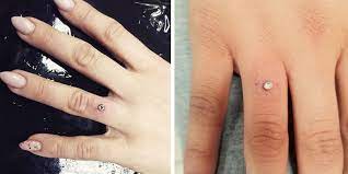 Painful New Engagement Ring Piercing Trend Growing In Popularity Piercing Hand Piercing Dark Jewelry