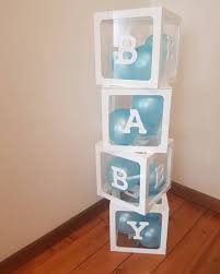 Simple Yet Stunning Balloons In A Box Baby Shower Idea Blue Is The Perfect Colour To Celebrate The Baby Shower Diy Baby Shower Themes Trendy Baby Shower Ideas