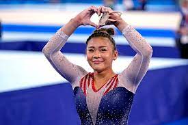 Sifan hassan of team netherlands celebrates as she walks the track with her country's flag after winning the gold medal in the women's 5,000 meter final on day 10 of the tokyo games. Suni Lee Wins All Around Gymnastics Gold Medal At Tokyo Olympics