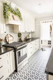 Nowadays, there are so many dream kitchen concepts that you can apply for remodeling. Black White Farmhouse Christmas Kitchen White Kitchen Floor White Farmhouse Kitchens Farmhouse Christmas Kitchen