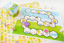 Layer the tissue paper squares onto the contact paper or laminating paper. Easter Roller Cube Game With Free Printable Mommy Made That