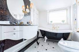The home remodel features a new kitchen, bathroom, and living area. 3 Key Design Elements For Your Art Deco Inspired Bathroom Daily Dream Decor