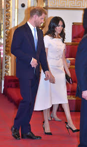 She rose to fame in her role as rachel zane in american drama series suits. Meghan Markle Wears Prada To The Queen S Young Leaders Awards Ceremony Vogue
