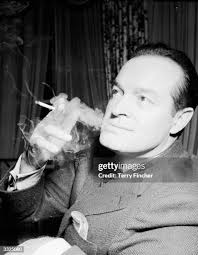 American actor Jack Benny plays violin during one of British-born... News  Photo