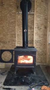 7 Things I Learned Installing An Off Grid Woodstove Diy Mother Earth News Wood Stove Installation Wood Stove Chimney Diy Wood Stove