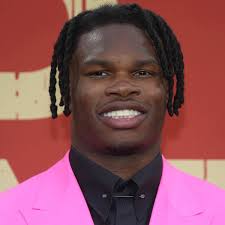 Travis Hunter's Hot Pink Suit Leads Boldest Fits at the NFL Draft