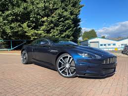 Image result for Midnight Blue 2011 Aston Martin