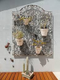 Grade De Ferro Fundido De Janela Usado Como Suporte Para Vasinhos De Plantas Decoracao De Parede Em Ferro Grades De Ferro Grades Para Janelas